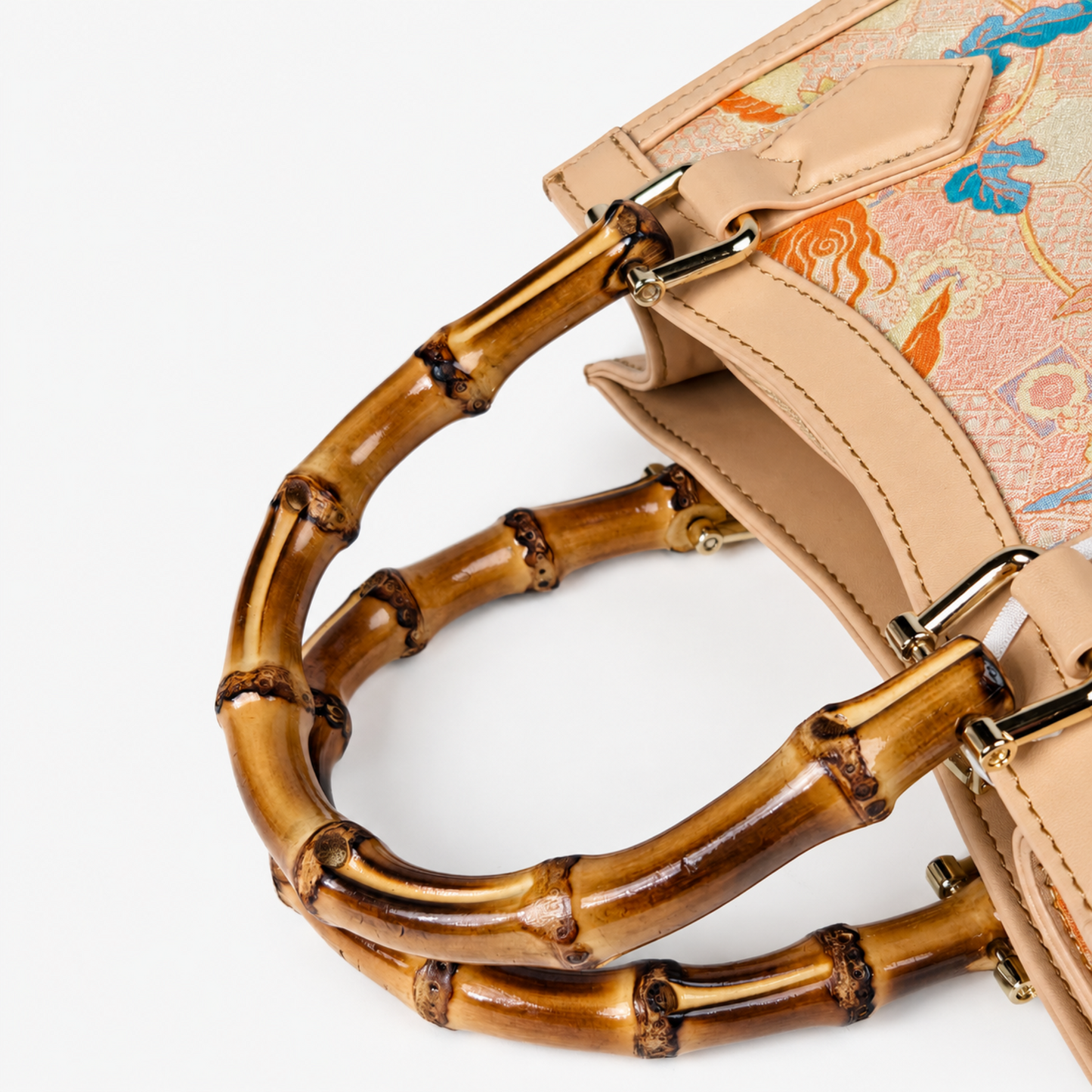 Elegant Hangzhou Silk Leather Bag with Unique Bamboo Handle