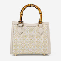 Elegant Hangzhou Silk Leather Bag with Unique Bamboo Handle